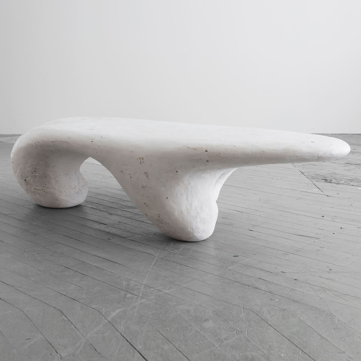 white sculptural coffee table